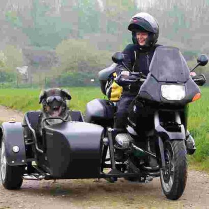 Eva on motorcyclewith dog